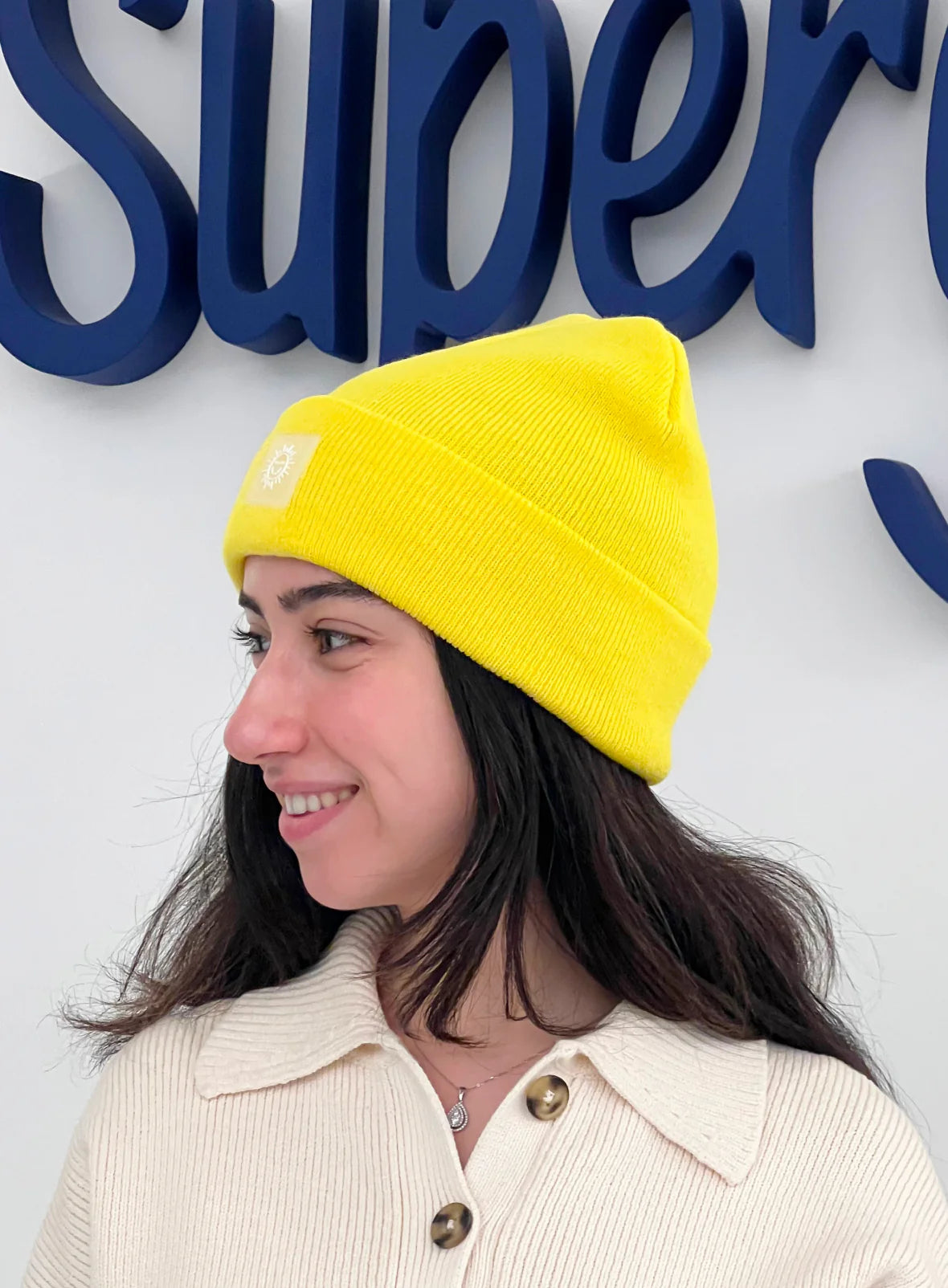 eaa7047c8f7211acfb23679d743cf565_a89a799c-5c62-4956-8cdd-9c8ccdd6bd10.jpg supergoop Sunshine Yellow Beanie - Image 2